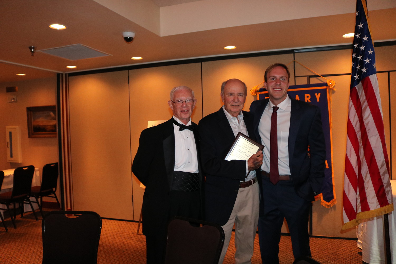 John “Jack” Hardman (center) receives the Volunteer Award from Ponte Vedra Recorder Editor Jon Blauvelt (right) and Rotarian Chuck Day (left).